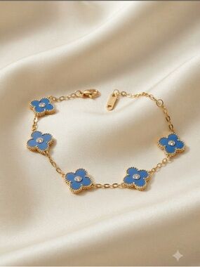 Fashion Jewelry Gold Bracelet with Blue Clover Charms